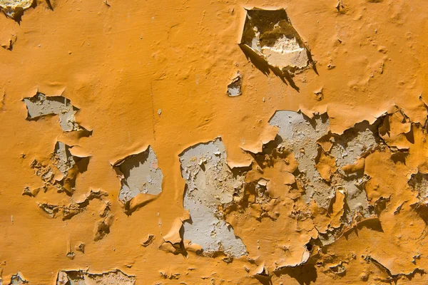 Bir duvara soyulması turuncu boya — Stok fotoğraf