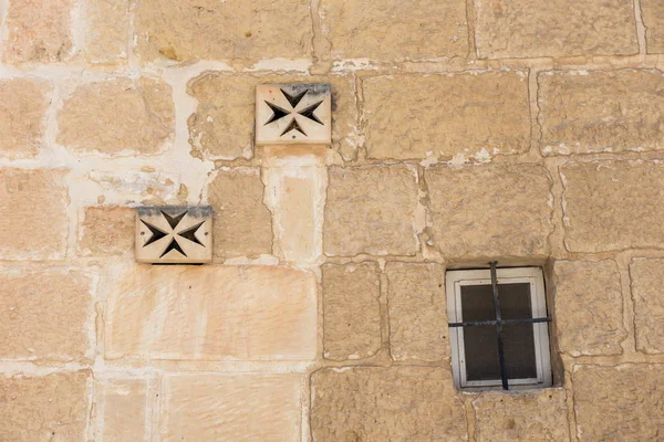 Ventilator on a stone wall. Maltese cross — Stock Photo, Image