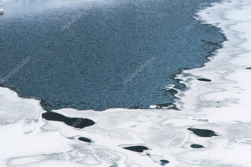 Extreme cold weather, frozen lake