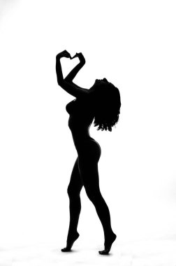 Beyaz izole bir seksi direk dansör silüeti