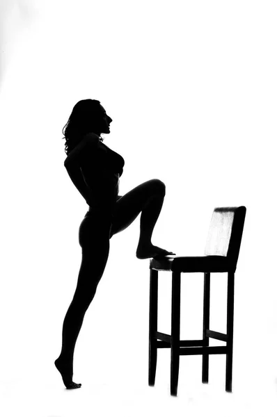 一个性感的极舞者的剪影孤立在白色 — 图库照片