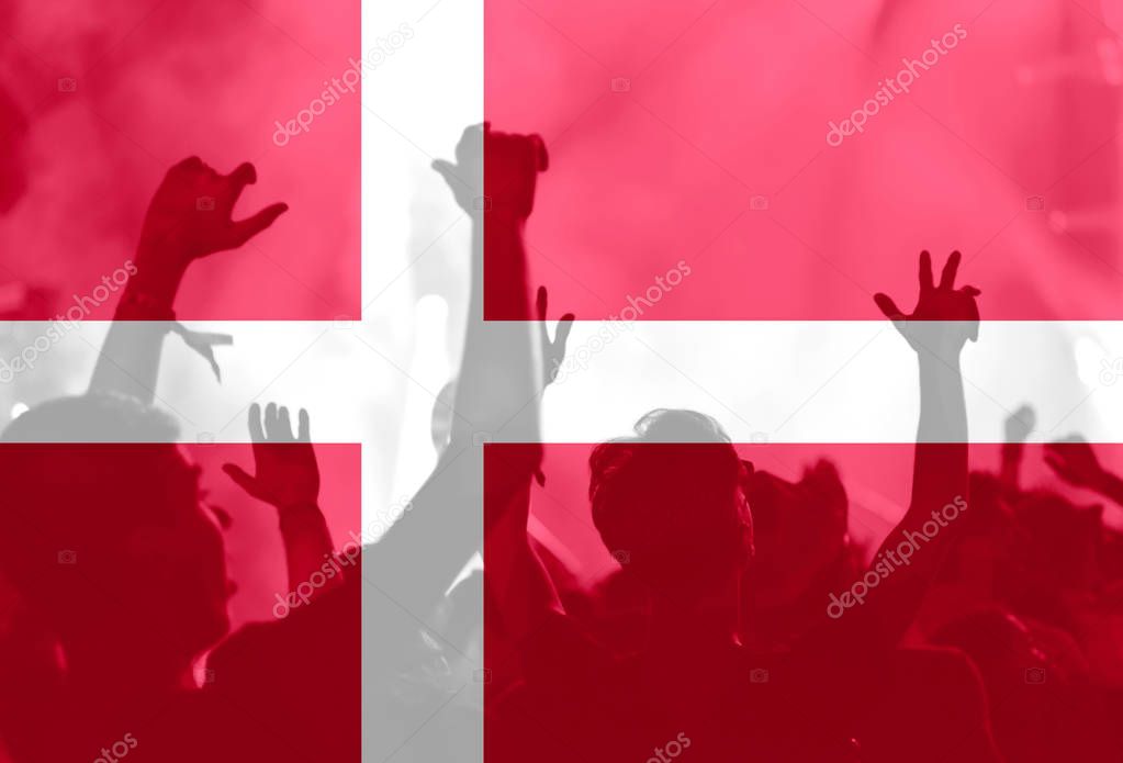 Football fans with blending Denmark flag