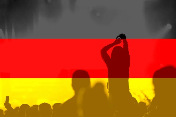 Football fans with blending Germany flag — Stock Photo, Image