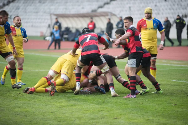 Les joueurs de rugby en action — Photo