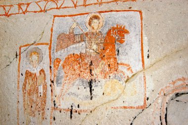 Freskler ve duvar resimleri bir mağara kilise içinde