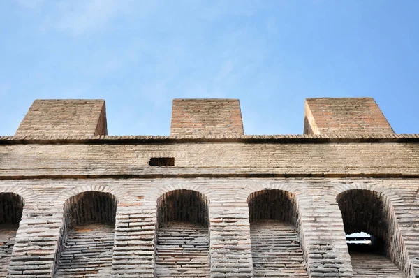 Old brick wall with arrow slit for archers — Stock Photo, Image