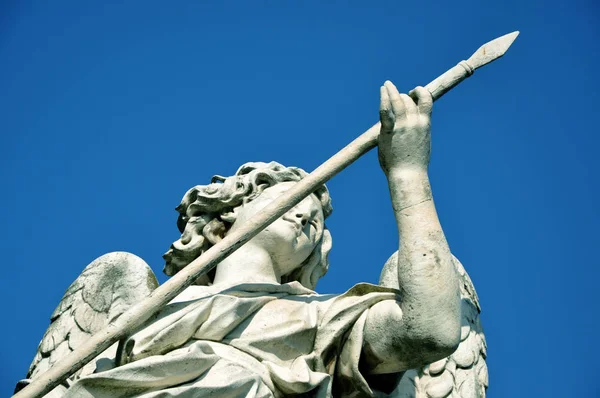 Statue of angel holding the holy lance — Stock Photo, Image