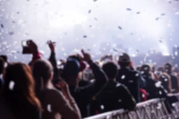 Blurred crowd of people at music festival — Stock Photo, Image