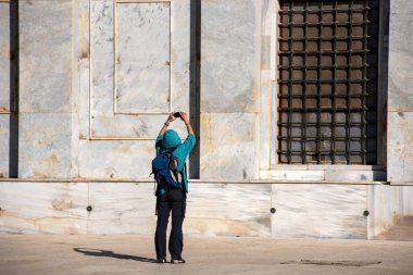 Tourist photographing the Dome of the Rock Islamic Shrine, Jerus