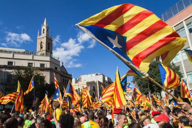 Catalans Waving Estelada Flags clipart