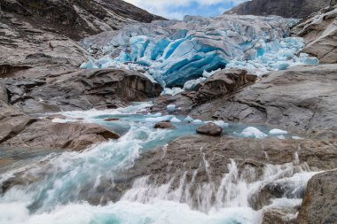 Melting of the Nigardsbreen Glacier, Jostedalsbreen National Park, Norway. clipart