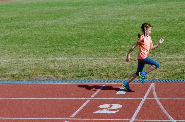 Kids sport, child running on stadium track, training and fitness concept — Stock Photo, Image