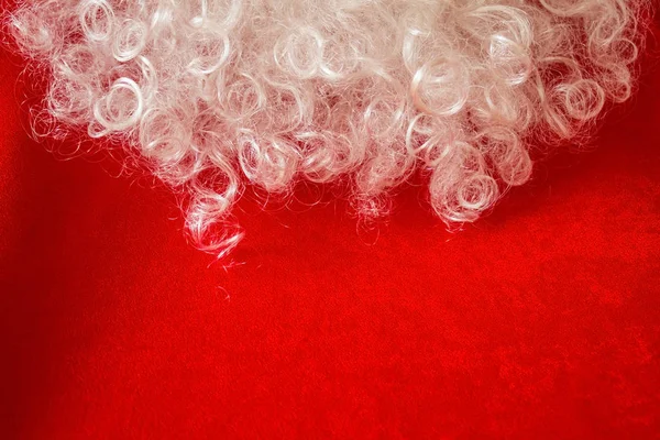 White beard on a red background. — 图库照片