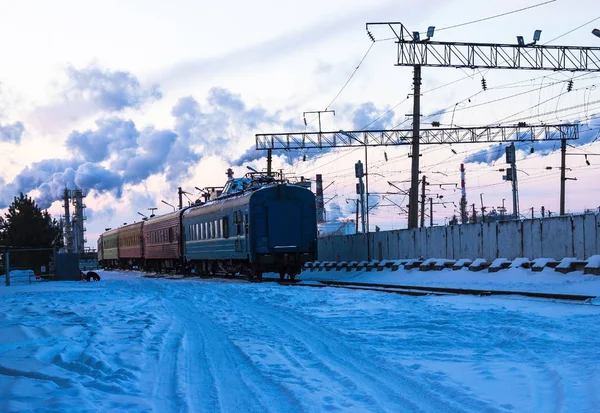 The train leaves into the distance.