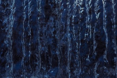 The texture is dark water.
