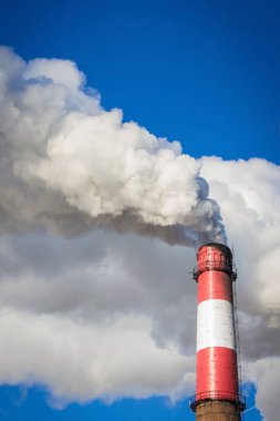 Blue sky, white smoke.
