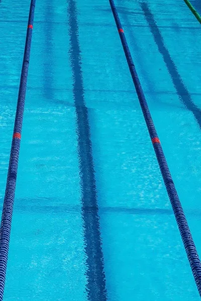 Sports Pool Paths Swimmers Bright Clear Blue Water Sunlight Vertical — Stock Photo, Image