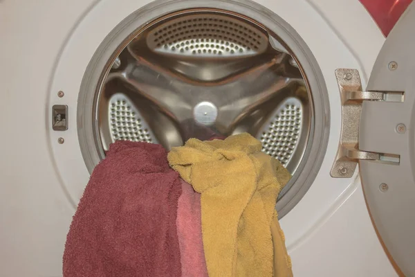 Dirty laundry in the washing machine. Crawl into someone else\'s life, stir up dirty laundry.
