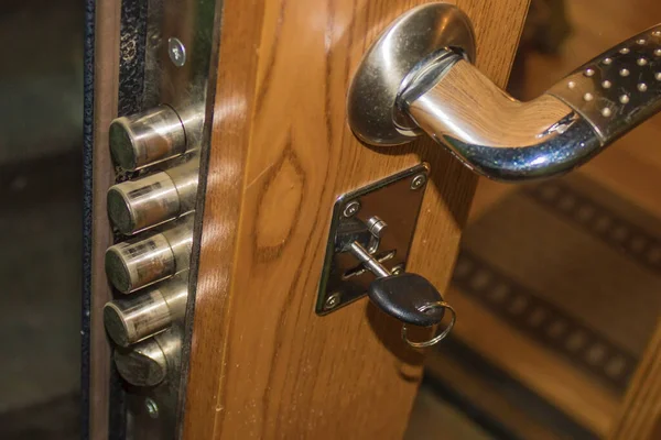 Key Inserted Lock Door Ajar Background Blurred — Stock Photo, Image