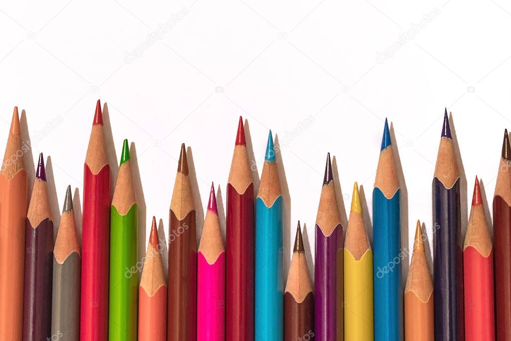 A number of colored pencils of different lengths. Bright colors, sharp sharpened slates. Each person is interesting, unique.