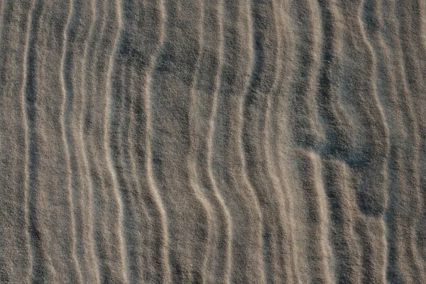 Grijs Zand Natuurlijke Textuur Verticale Golvende Lijnen Van Verschillende Dikte — Stockfoto