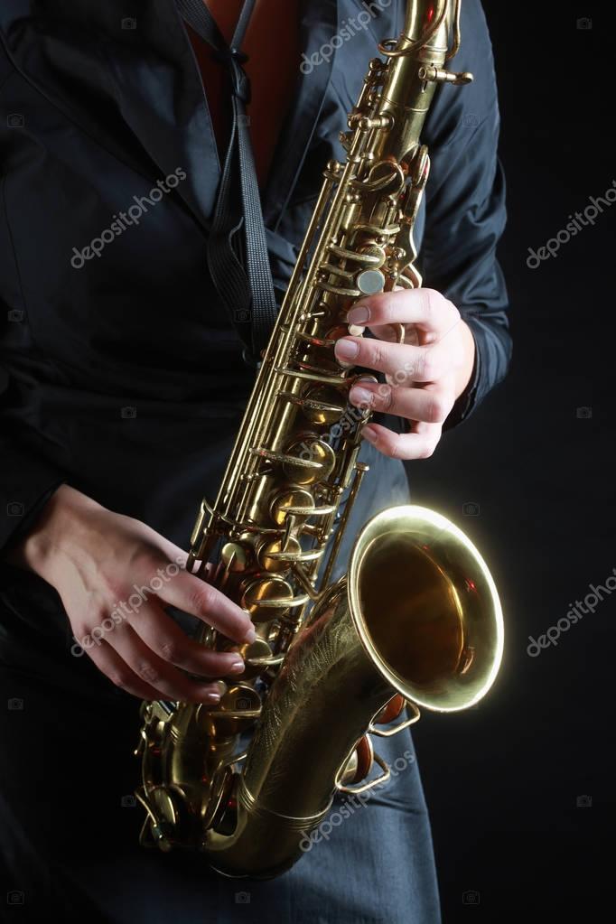 Saxophone Player Saxophonist playing jazz music. Sax alto — Stock Photo © alenavlad 153853344