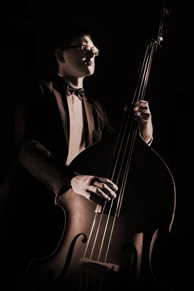 Double bass player playing contrabass — Stock Photo, Image