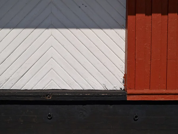 Holzwand und schwarzer Beton abstrakten Hintergrund — Stockfoto