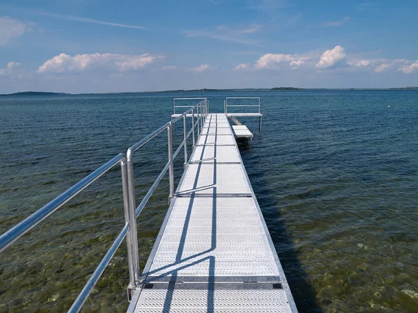 Modern jetty pier made of metal — Stock Photo, Image