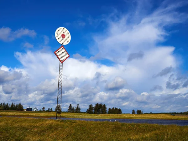 Sea nautical navigation mark on the shore — Stock Photo, Image