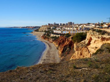 Popular summer travel destination Campoamor Orihuela Coast Spain clipart