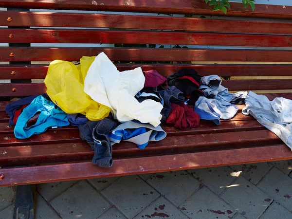 Clothes Left Street Charity Poor People Need Social Issue Background — Stock Photo, Image