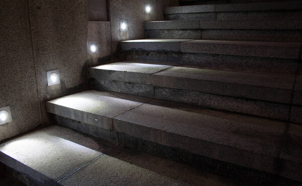 Illuminated stairs at night