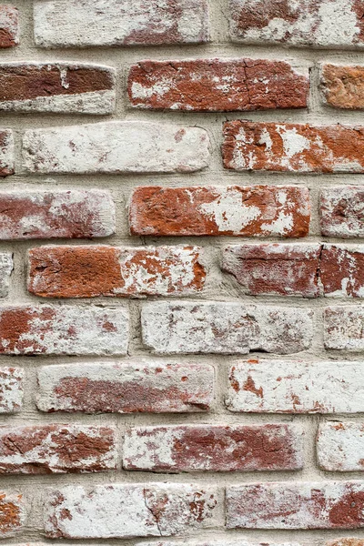 Rode bakstenen muur geschilderd wit. textuur, achtergrond, ontwerp. — Stockfoto