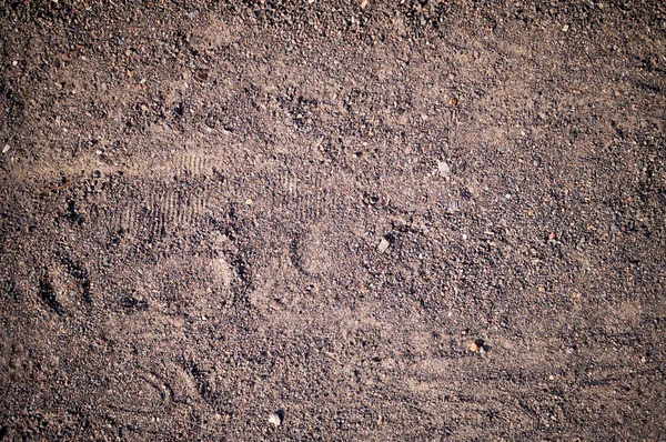 önyükleme ile kumlu yolu izler. arka plan, doku.