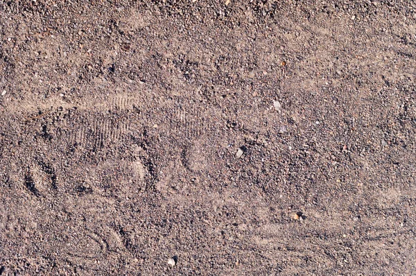 Sandy path with boot tracks. background, texture. — Stock Photo, Image