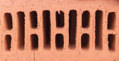 Turuncu kil tuğla yığını. doku, arka plan.