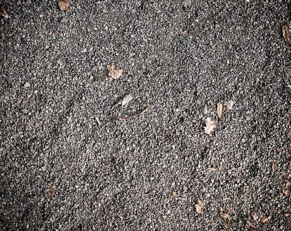 Szürke szemcsés homokos talaj. háttér textúra. — Stock Fotó