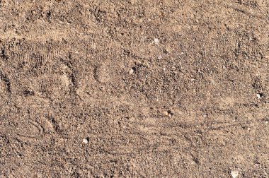 kumlu yol yol çizme ile izler. arka plan, doku.