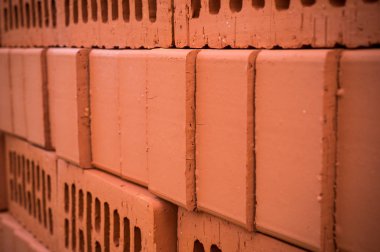 Turuncu kil tuğla yığın, yığın. doku, arka plan.