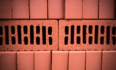 Turuncu kil tuğla yığın, yığın. doku, arka plan.