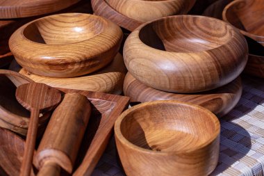 wooden utensils. natural wood kitchen utensils - plates and supplies