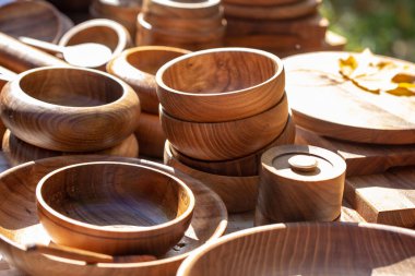 wooden utensils. natural wood kitchen utensils - plates and supplies