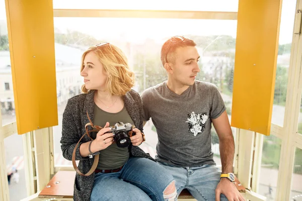 Loving couple on a ferris wheel — Stok Foto