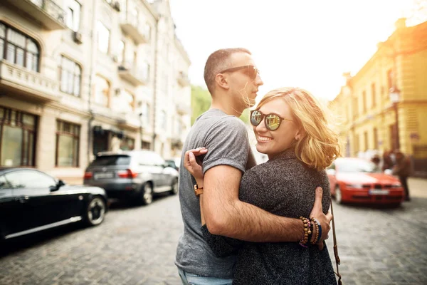 Loving young couple are walking around the city — 스톡 사진