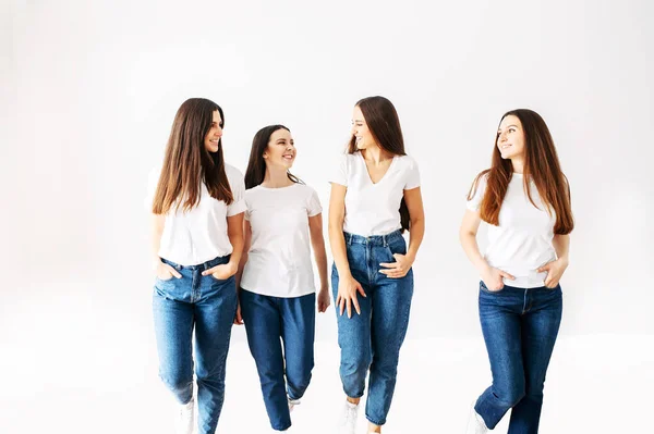 Happy young girls talk and smile — Stock Photo, Image