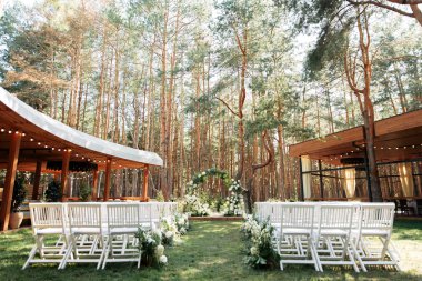 Outdoor wedding ceremony in the summer
