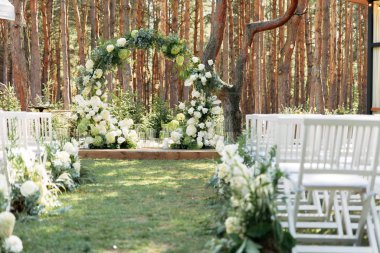 Outdoor wedding ceremony in the summer
