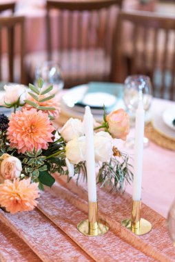 Elegant decor of a wedding bank in peach and green
