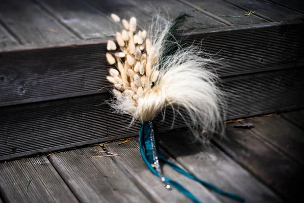 Bridal bouquet with feathers and dried spikelets — ストック写真